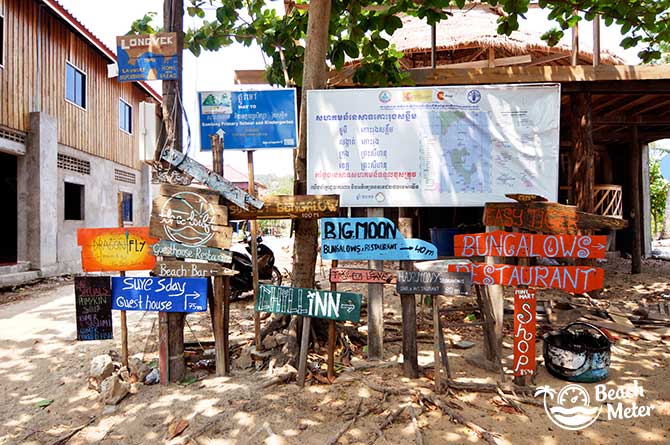 Accommodation and restaurant signs from M'Pay Bay Village, Koh Rong Samloem. © Beachmeter.com